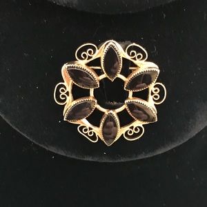 Vintage gold-filled pin with black onyx stones